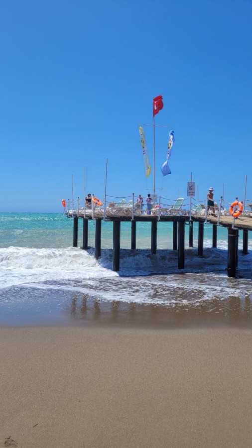 Пляж и пирс отеля Port Nature Luxury Resort Hotel Spa 5*